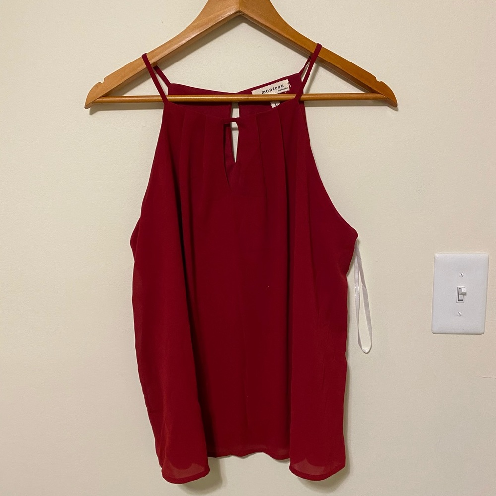 Red sleeveless blouse